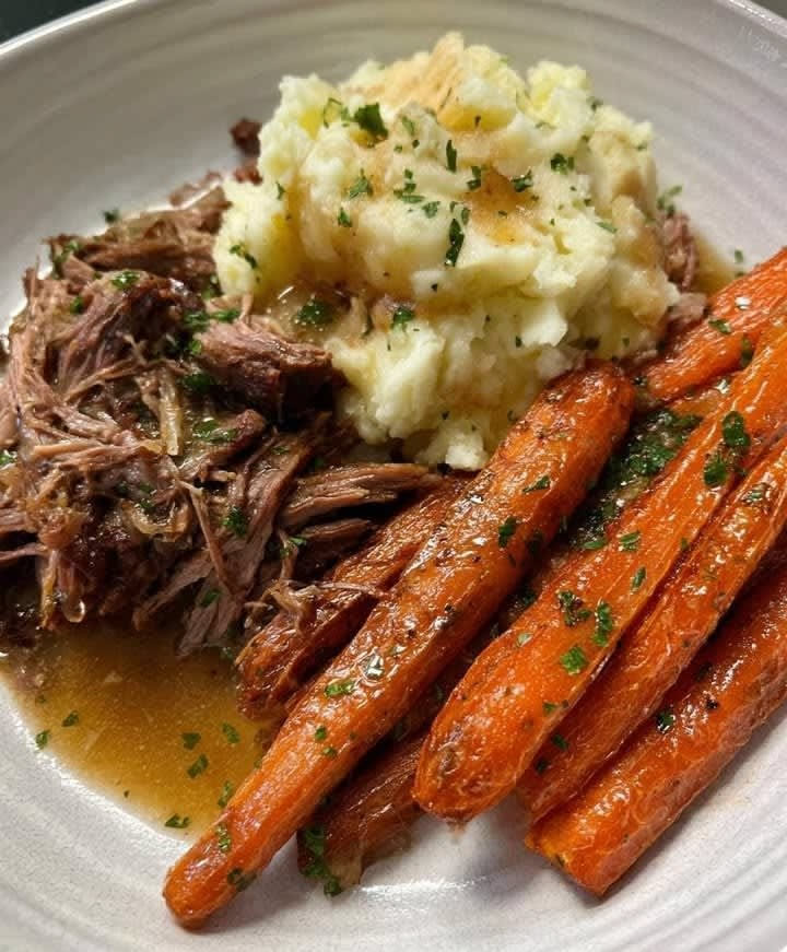 roast beef with carrots and mashed potatoes